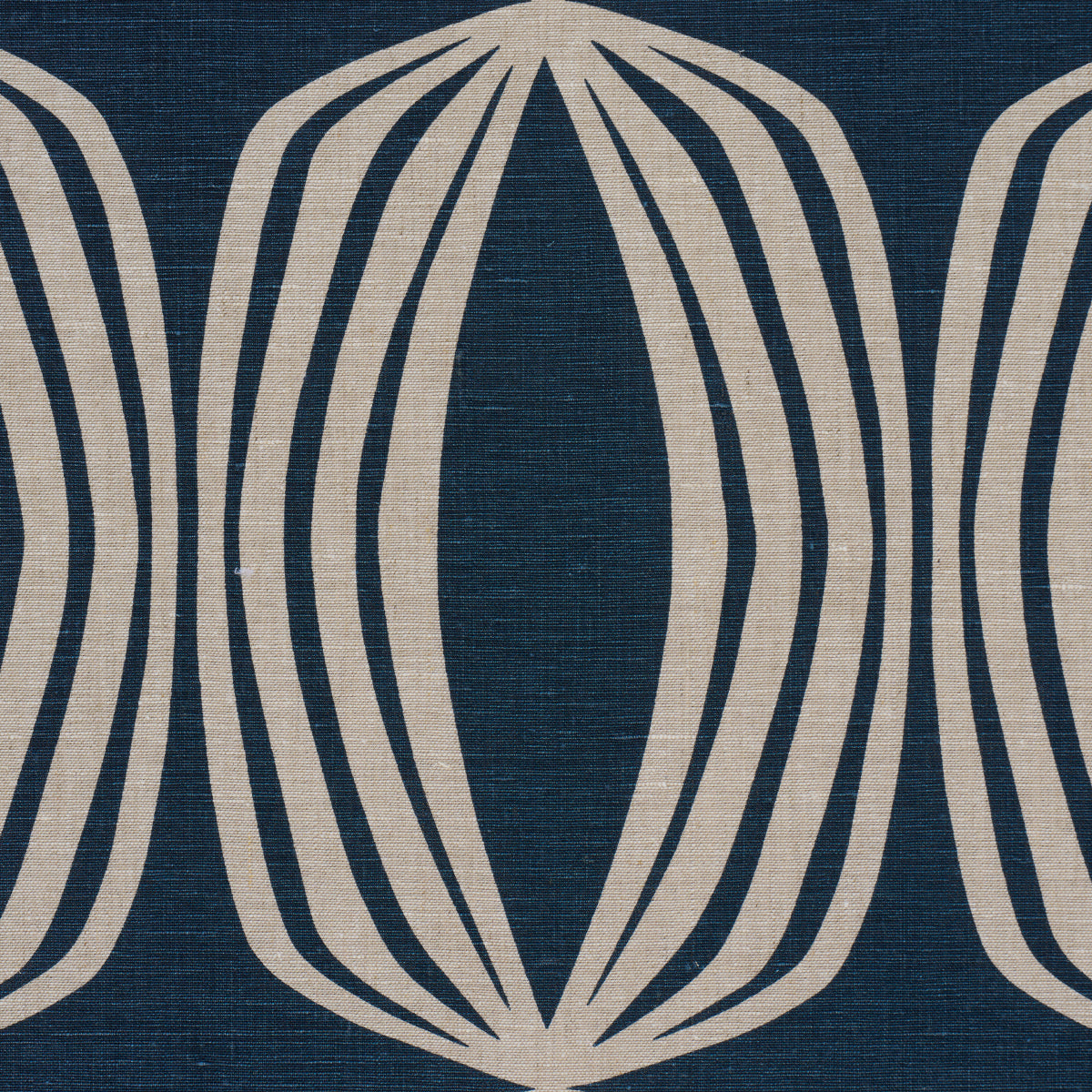 Navy blue fabric with cream-beige interlocking oval loop pattern; mid-century upholstery fabric.