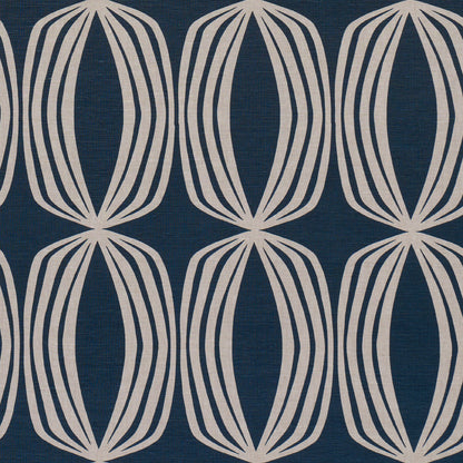 Indigo fabric with repeating cream oval lattice motifs formed by curved lines.