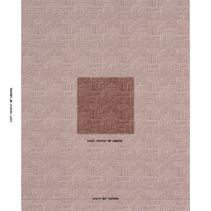 Beige woven rug with a central dark brown square patch; repeating geometric lattice pattern; decorative floor covering.