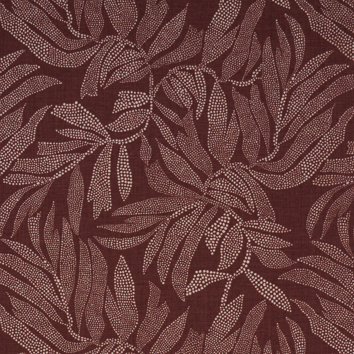 Maroon fabric with pale pink dotted leaf pattern; botanical textile with flowing leaves.