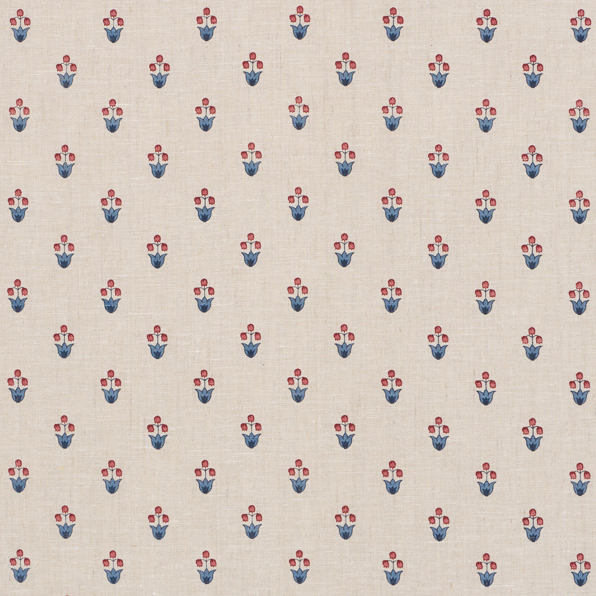 Beige linen fabric with small repeating red and blue tulip floral pattern, vintage folk-inspired textile.