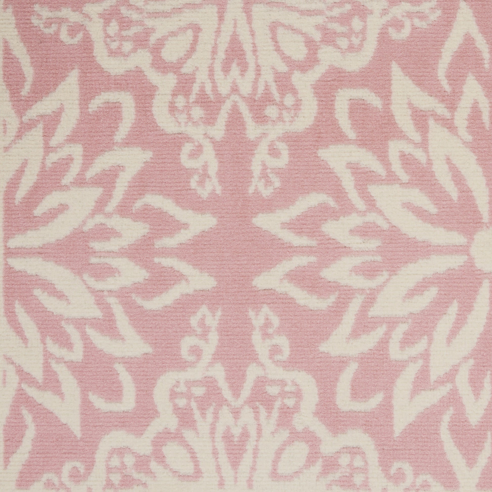 Pink rug with a white damask floral pattern in a jacquard-style design, 3' x 5'.