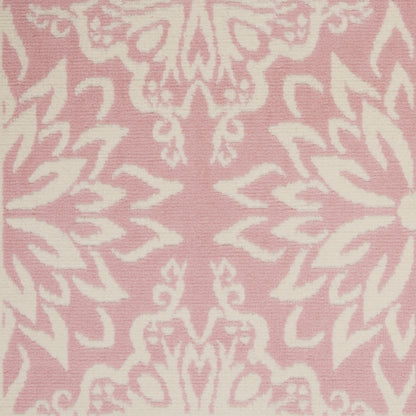 Pink rug with a white damask floral pattern in a jacquard-style design, 3' x 5'.