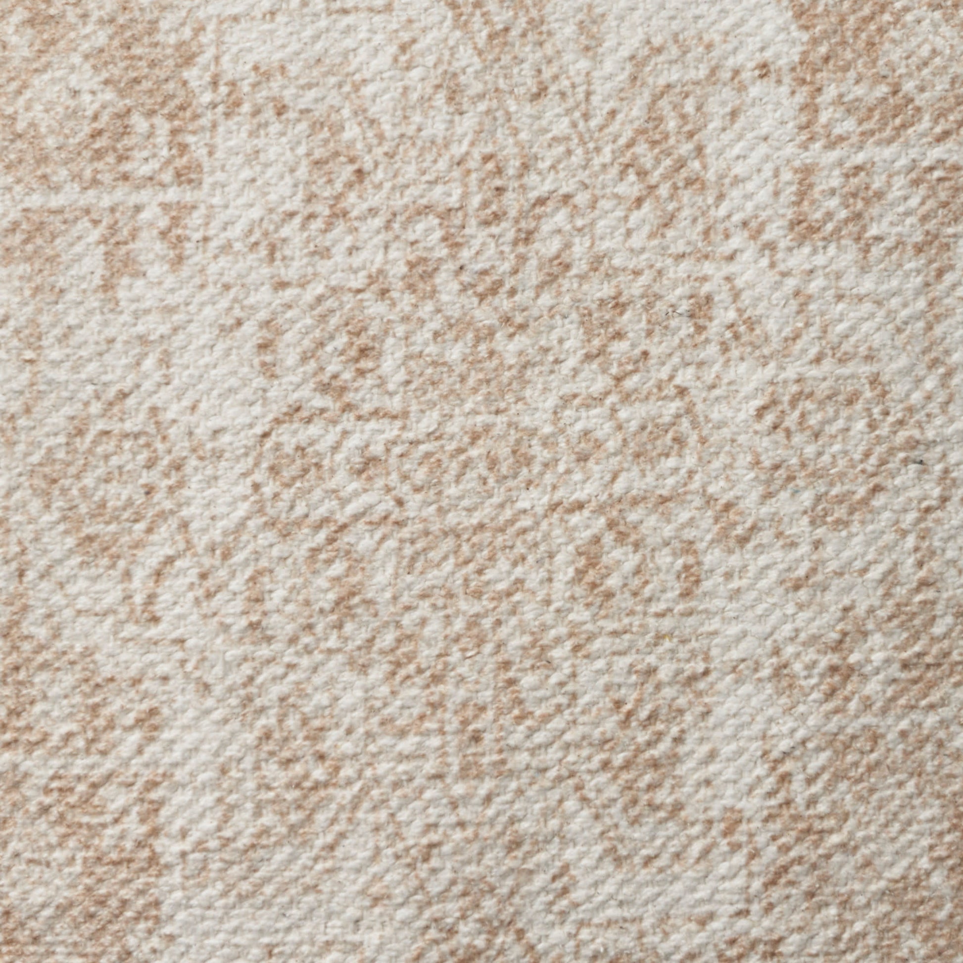Beige damask-style rug with plush pile and subtle tan patterns.