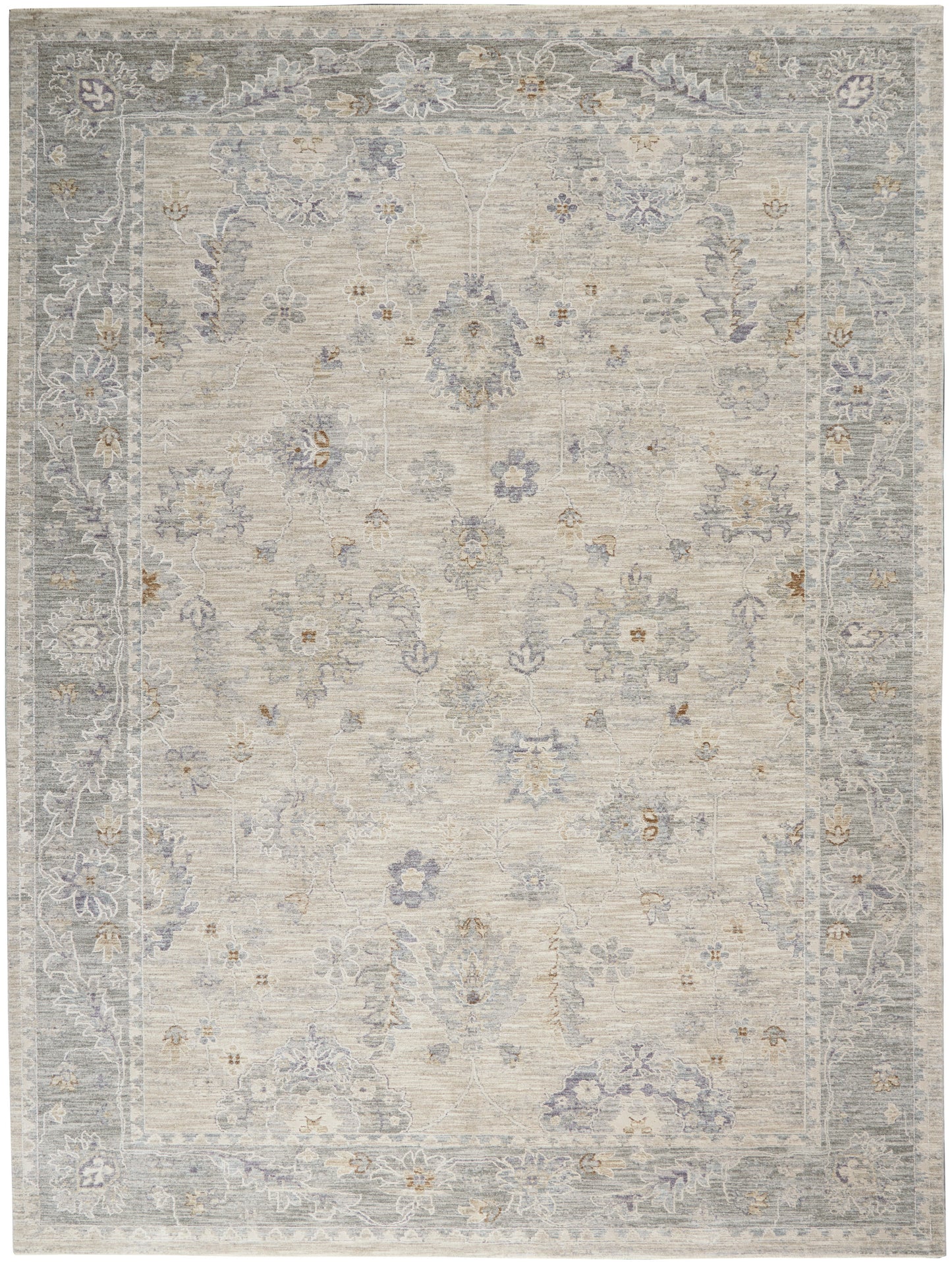 Beige area rug with muted blue-gray border and lilac floral accents in a vintage Persian-inspired pattern.