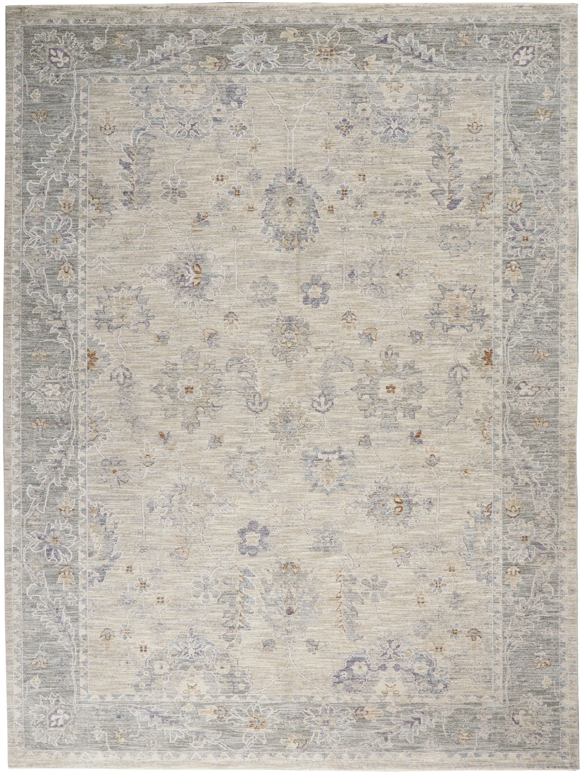 Beige area rug with muted blue-gray border and lilac floral accents in a vintage Persian-inspired pattern.