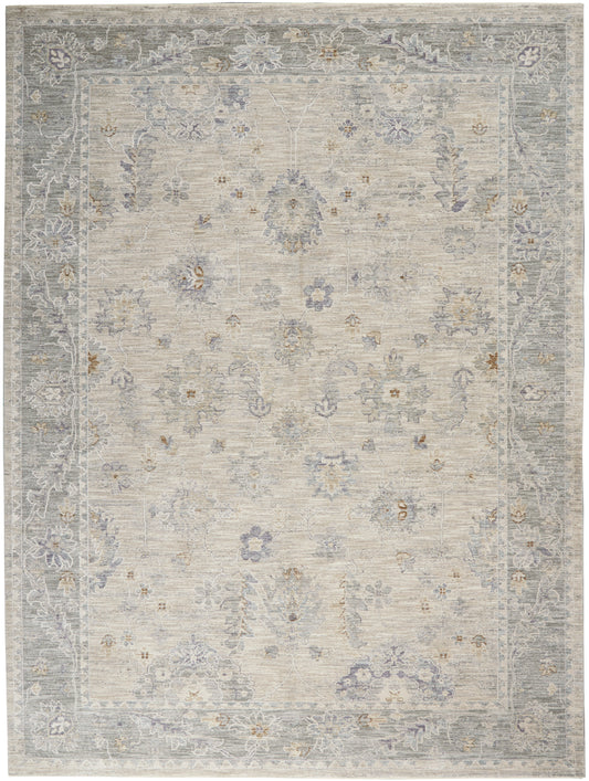 Beige area rug with muted blue-gray border and lilac floral accents in a vintage Persian-inspired pattern.