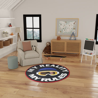 Cozy kids' playroom with beige armchair, pastel pillow, panda plush, skateboard, and a 5' round rug reading MY REALITY MY RULES.