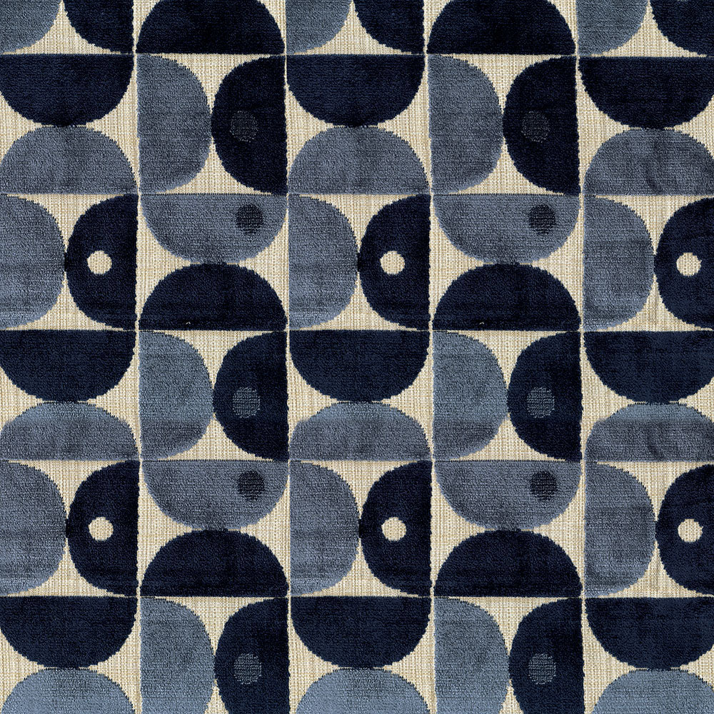 Geometric velvet fabric with overlapping navy and gray semicircles forming a repeating arc pattern on a cream background.