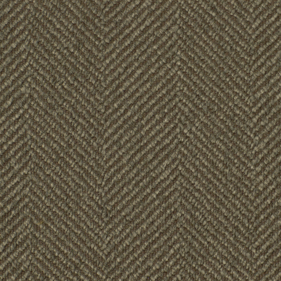 Slate herringbone tweed fabric texture with a woven chevron pattern; wool-like and suitable for upholstery.