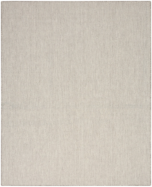 Beige woven rug with a tiny dot/mesh pattern; modern style, 8' x 10'.
