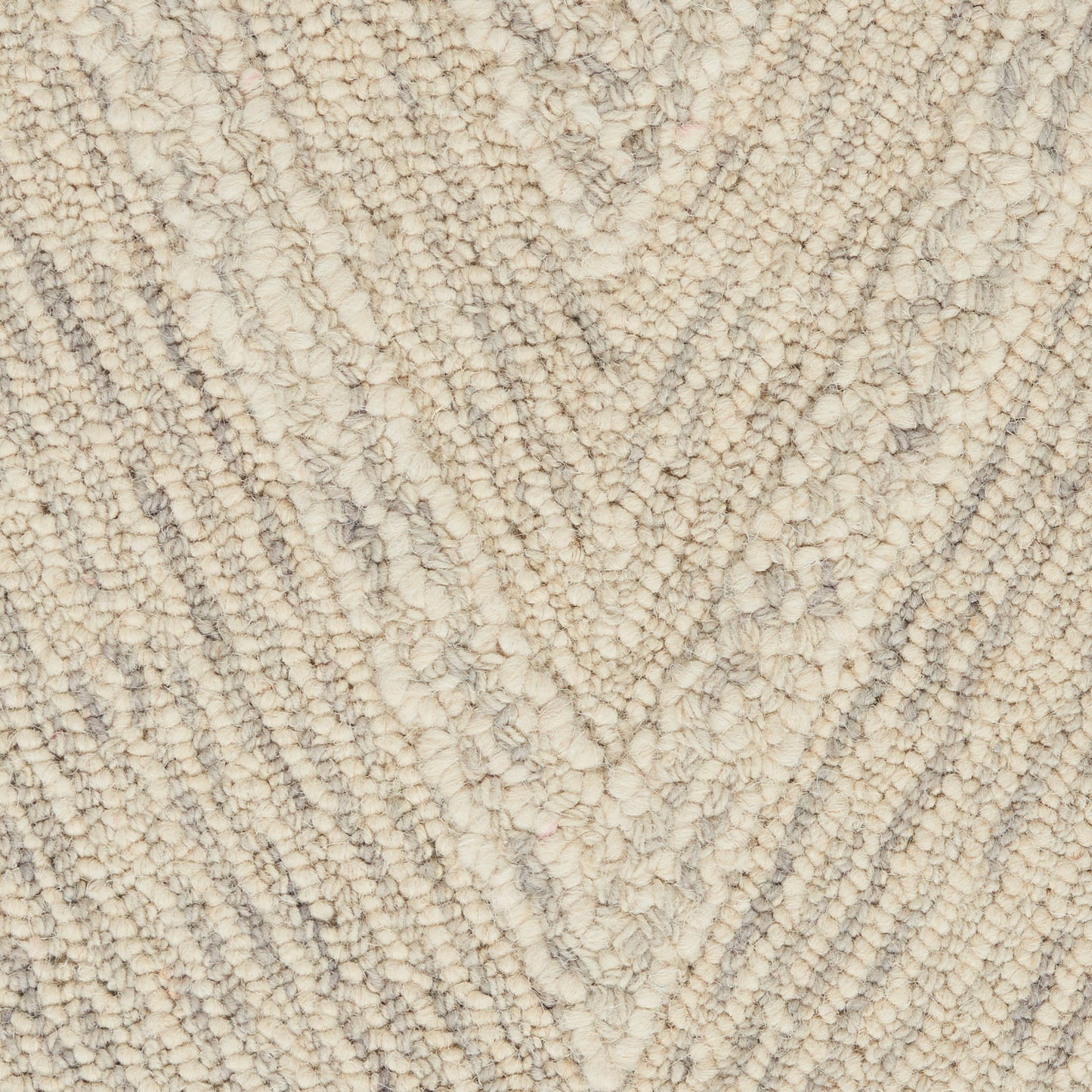 Cream and light gray chevron rug with soft, fluffy loop-pile texture.