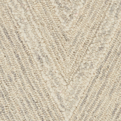 Cream and light gray chevron rug with soft, fluffy loop-pile texture.