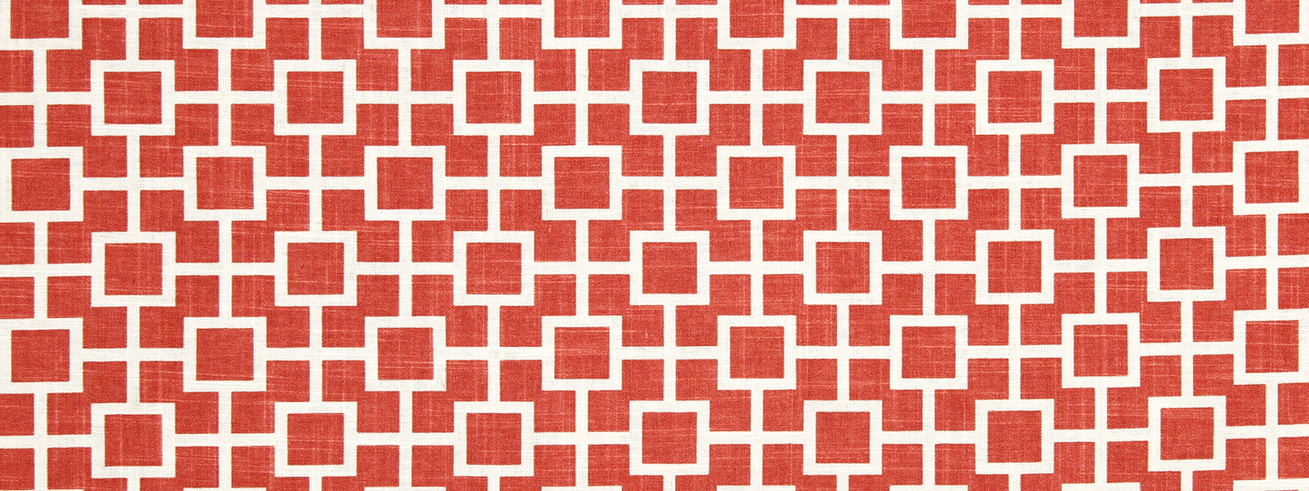 Red and white geometric grid drapery fabric with interlocking square motifs; woven texture, modern decorative textile.