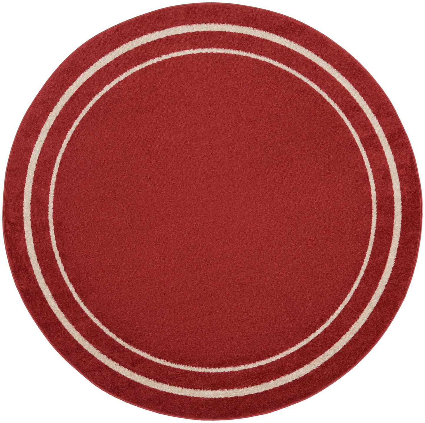 Round red area rug with two cream rings near the edge; soft plush texture.