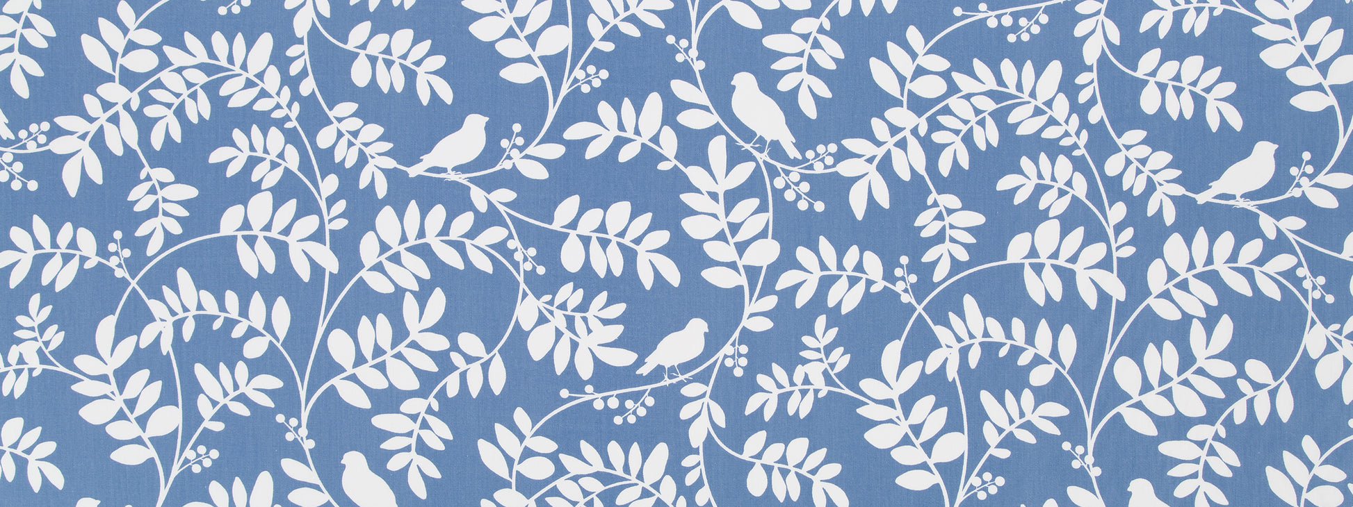 Blue drapery fabric with white botanical leaves and small birds in a repeating pattern.
