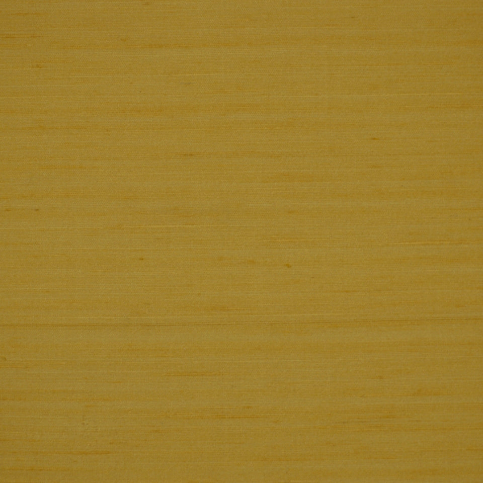 Straw-colored fabric texture with a subtle weave pattern.