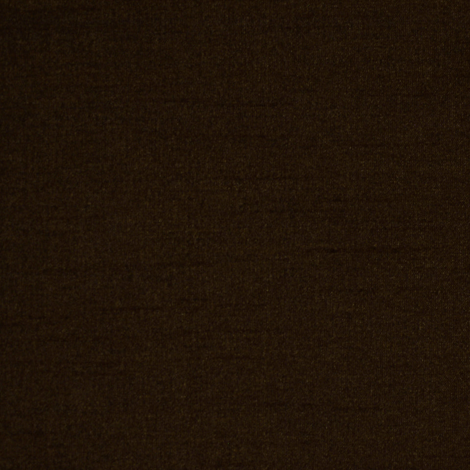 Dark brown fabric texture close-up with subtle weave; versatile upholstery or apparel material.