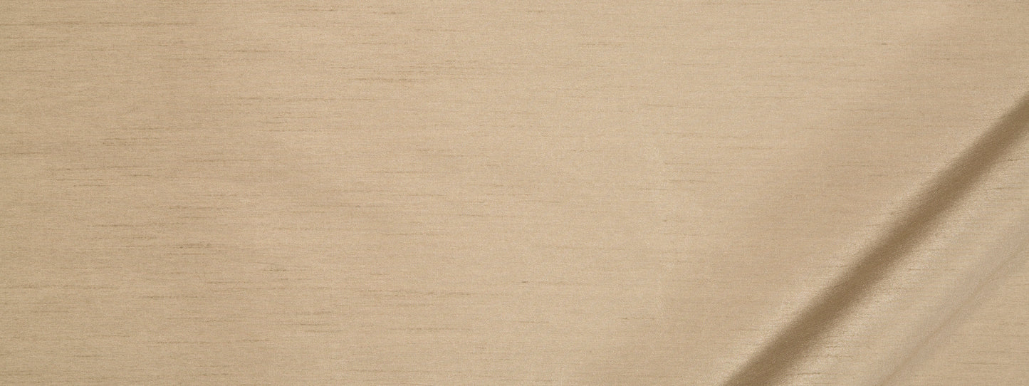 Beige linen-look fabric with a diagonal fold at the bottom-right corner.