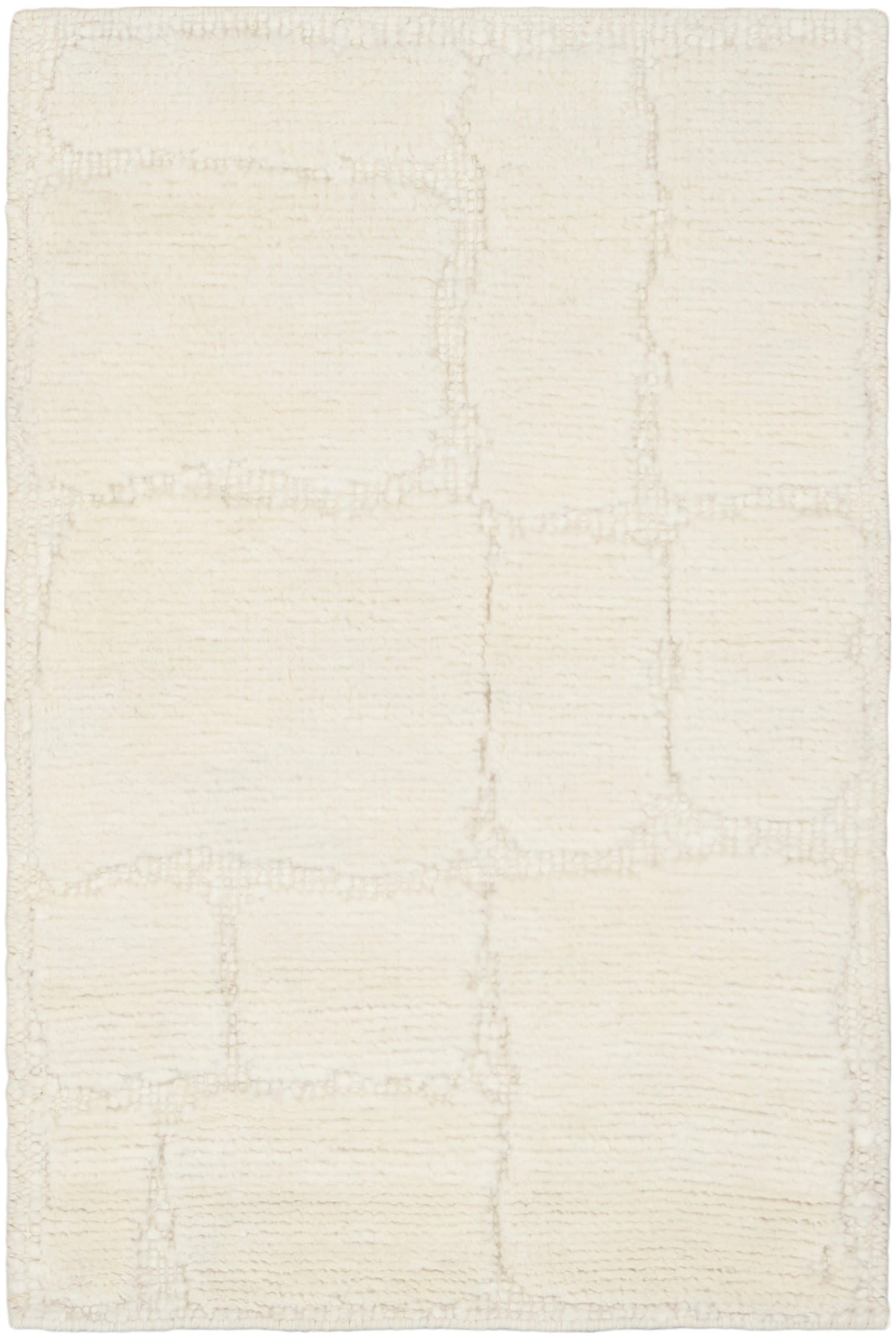 Cream rug with a subtle grid of rectangular patches; soft textured woven look; 2' x 3' rug, neutral floor covering