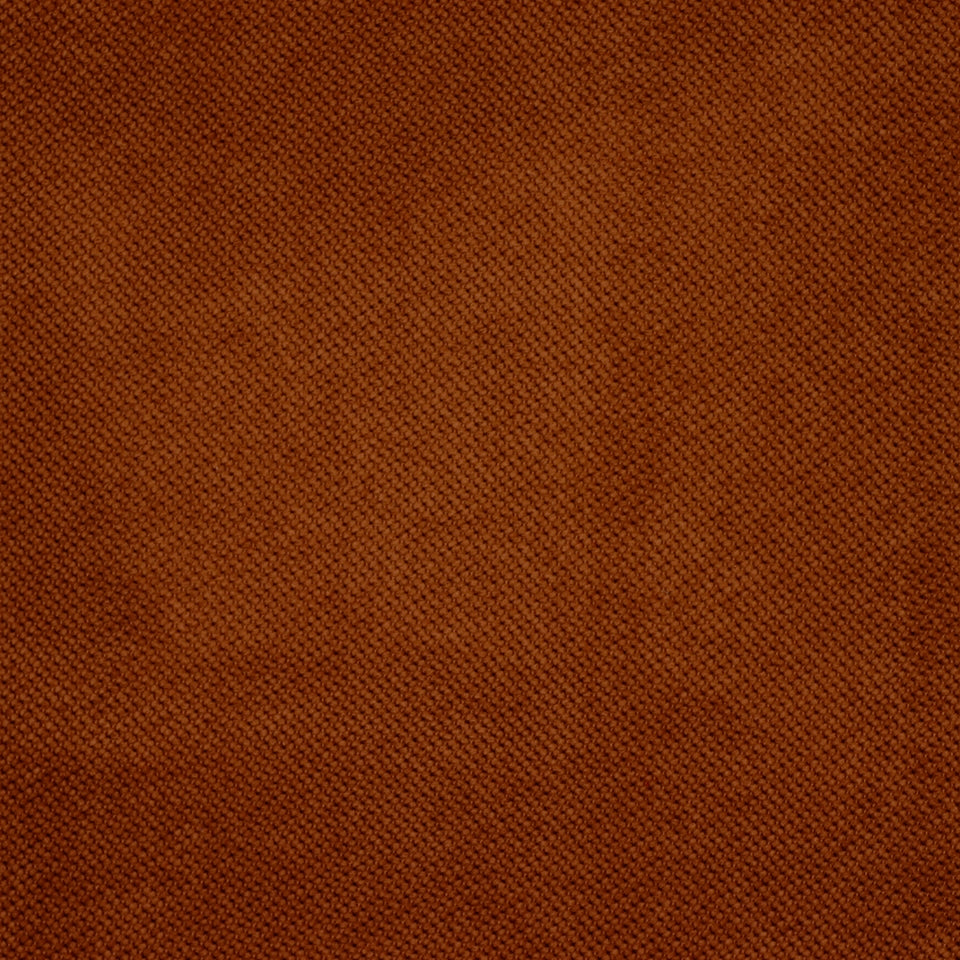 Rust brown fabric texture close-up with tight weave.