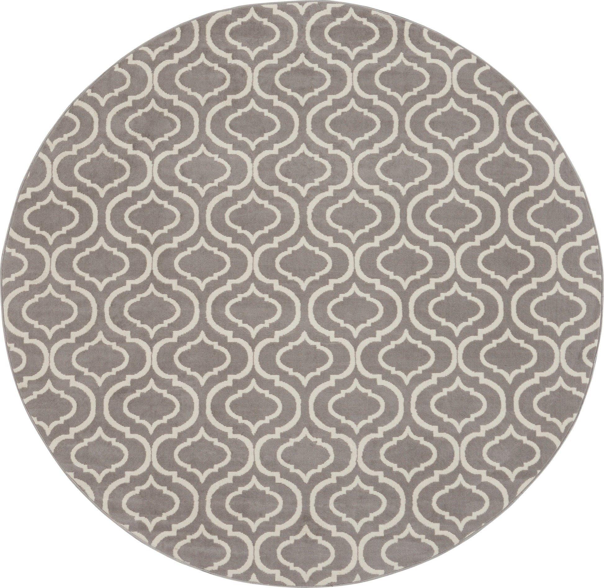 Round taupe rug with white arabesque lattice pattern, soft textile for living room decor.