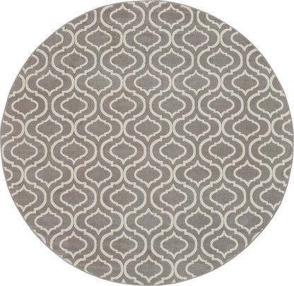 Round taupe rug with white arabesque lattice pattern, soft textile for living room decor.