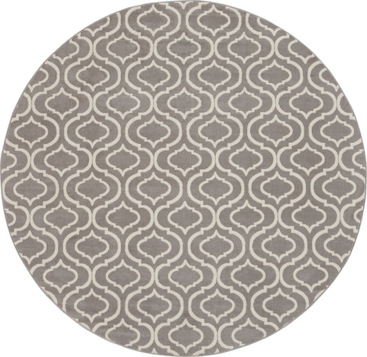 Round taupe rug with white arabesque lattice pattern, soft textile for living room decor.