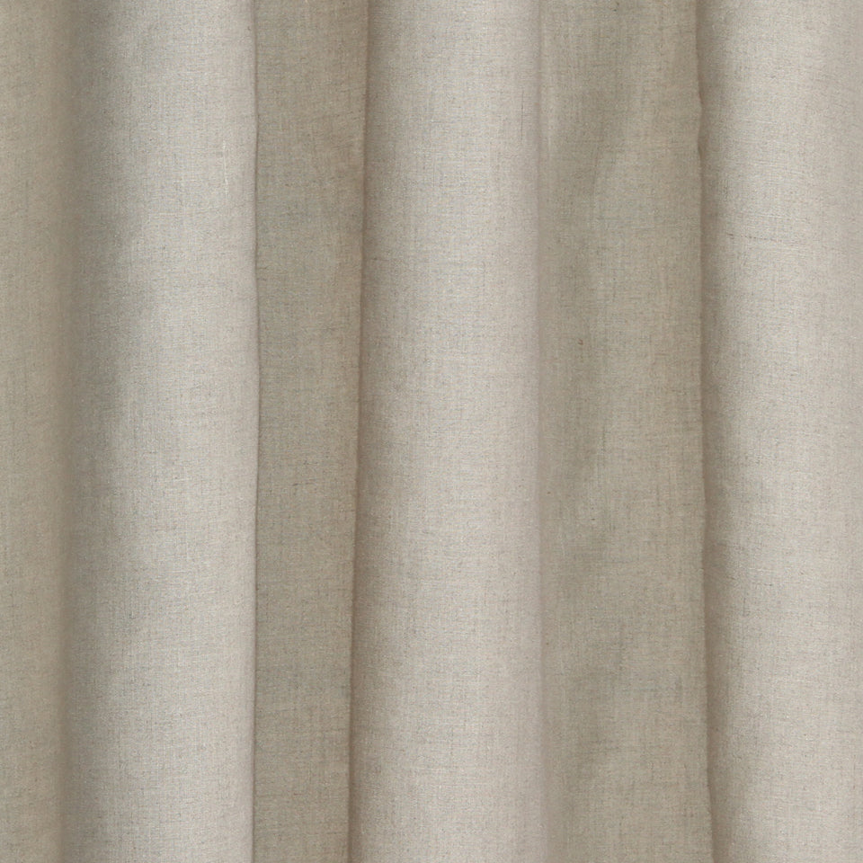 Beige sheer curtain fabric with soft vertical folds, neutral window drapery.