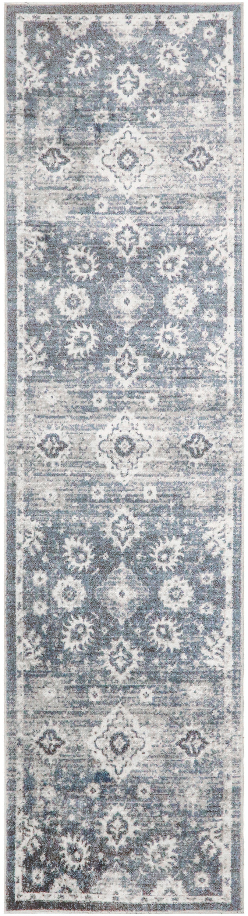Blue-gray narrow runner rug with repeating diamond and floral medallions; distressed vintage look, ideal for hallways.