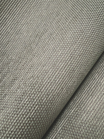 Argent dusty blue wallpaper with a subtle ribbed woven texture.