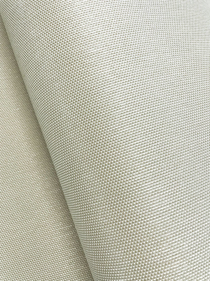 Beige wallpaper close-up with a tight, uniform grid-like weave.