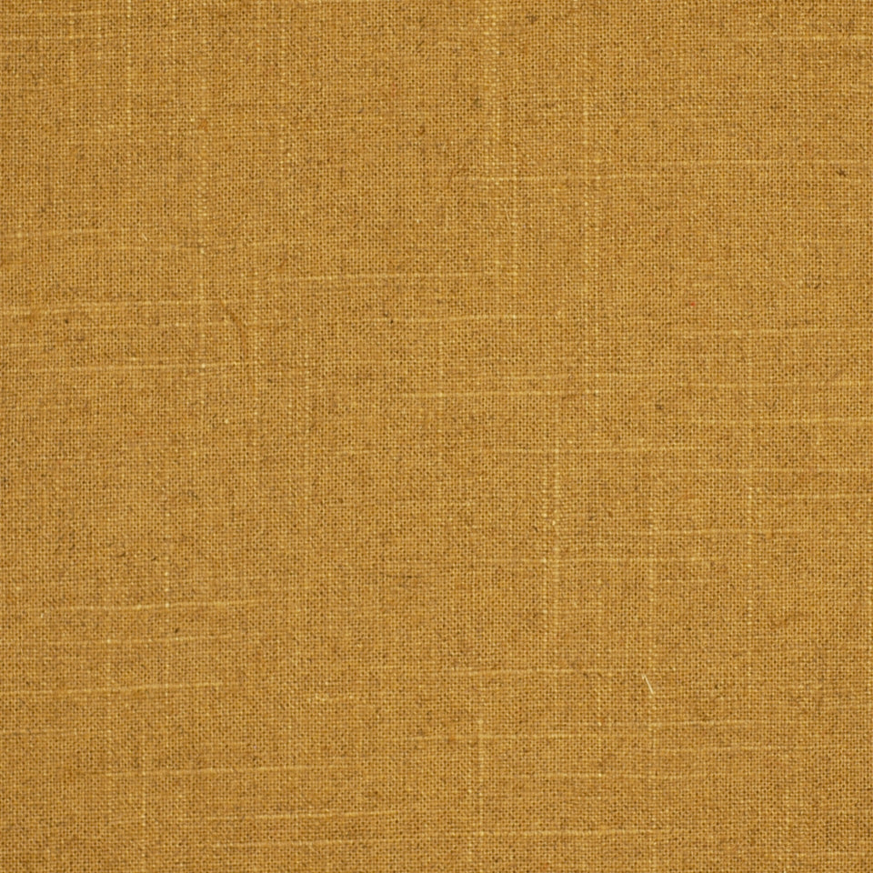 Golden-brown woven drapery fabric texture with a coarse weave and rustic look.