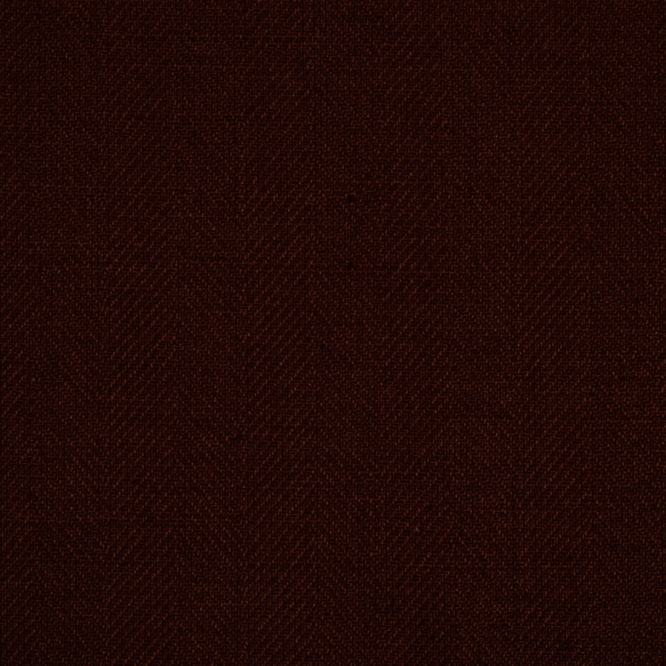 Dark brown fabric texture close-up; woven upholstery fabric with subtle grain.