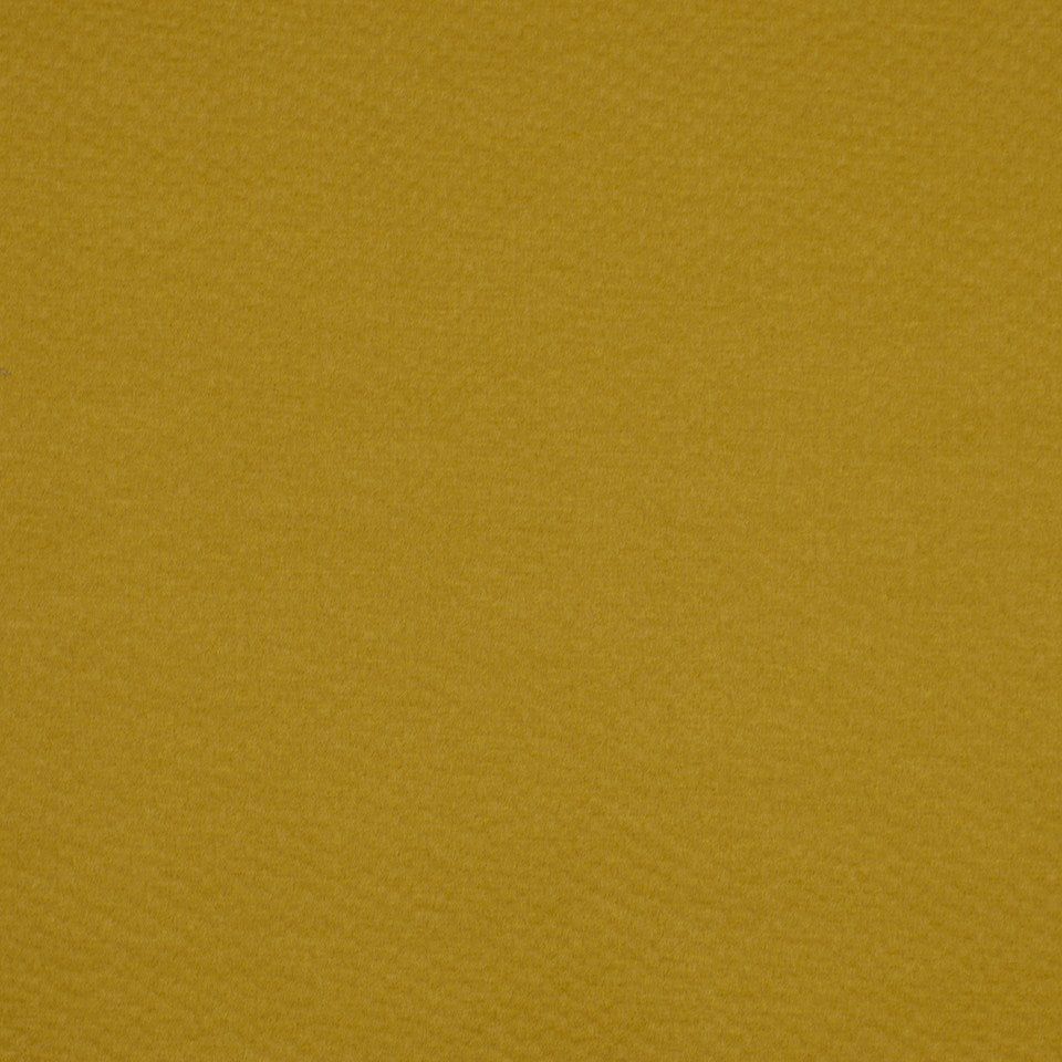 Mustard yellow textured upholstery fabric with fine grain.