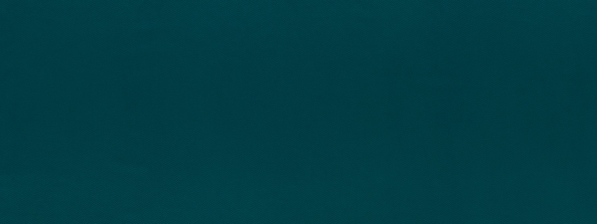 Teal blue upholstery fabric swatch; smooth, no texture.