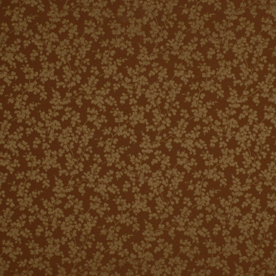 Brown background with beige floral vine pattern of tiny blossoms; vintage-inspired upholstery fabric.