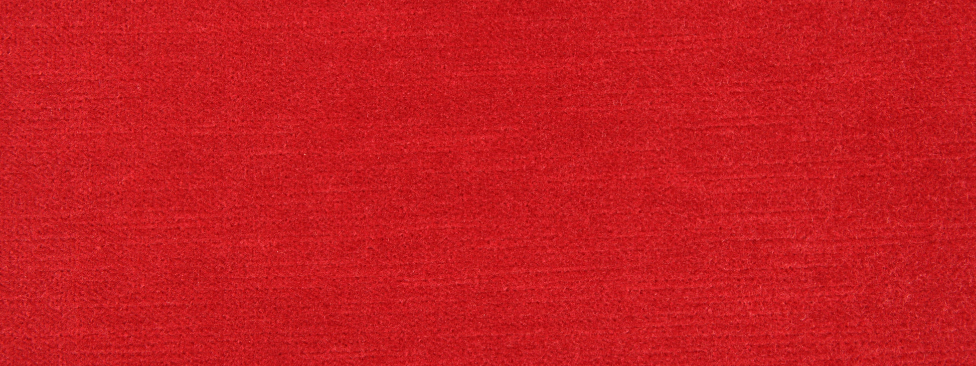 Close-up of bright red woven fabric texture with subtle weave pattern.