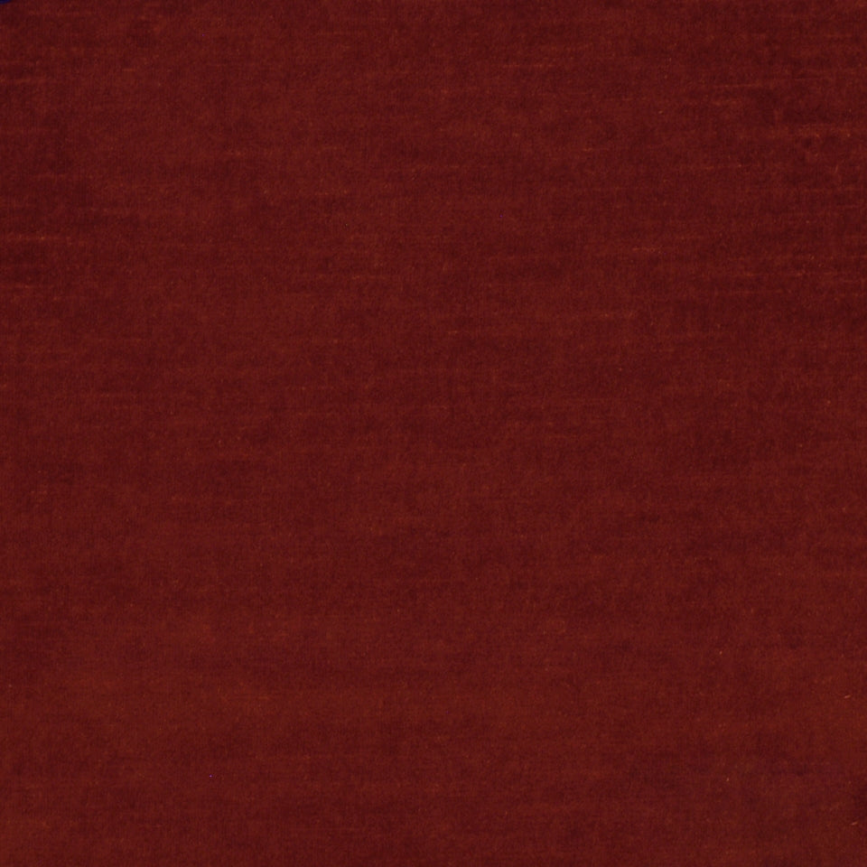 Dark burgundy velvet fabric with subtle texture and sheen.