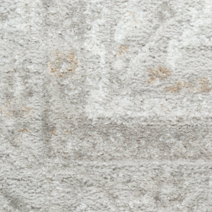 Creamy gray shag rug with ivory highlights and beige specks; plush high-pile texture.