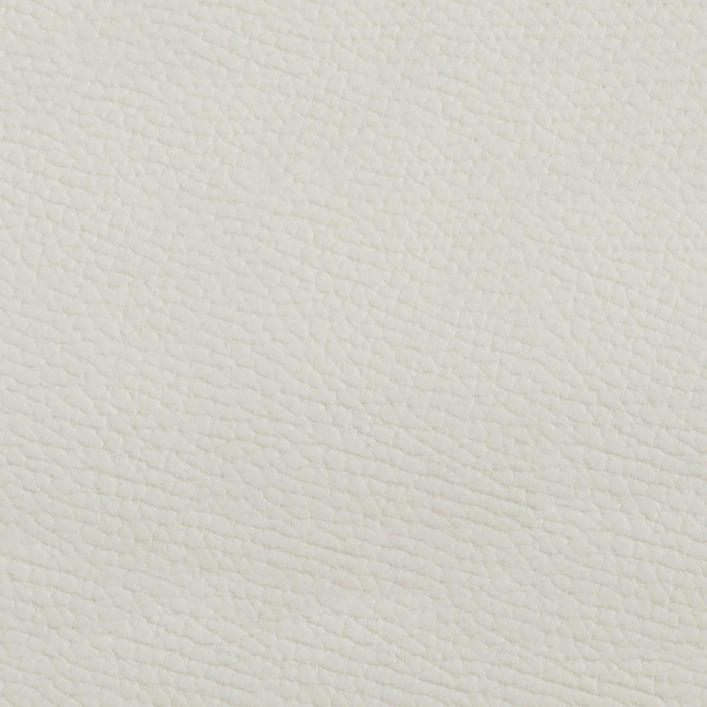 White solid fabric close-up showing smooth textile texture.