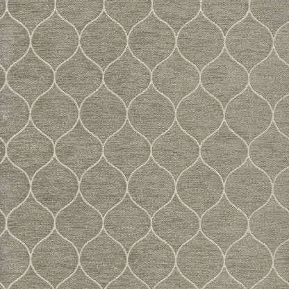 Taupe woven fabric with white curved lattice trellis pattern; upholstery or drapery textile.
