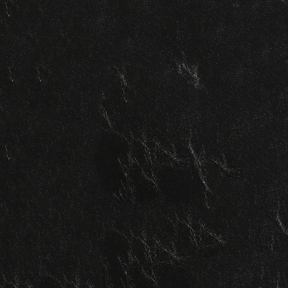 Black marble-like surface with subtle white veining; sleek glossy countertop or backsplash material.
