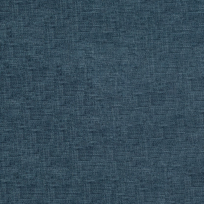 Close-up of indigo solid fabric with a subtle woven texture.