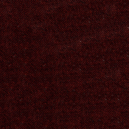 Close-up of dark burgundy twill fabric with a fine diagonal weave and rich textile texture.