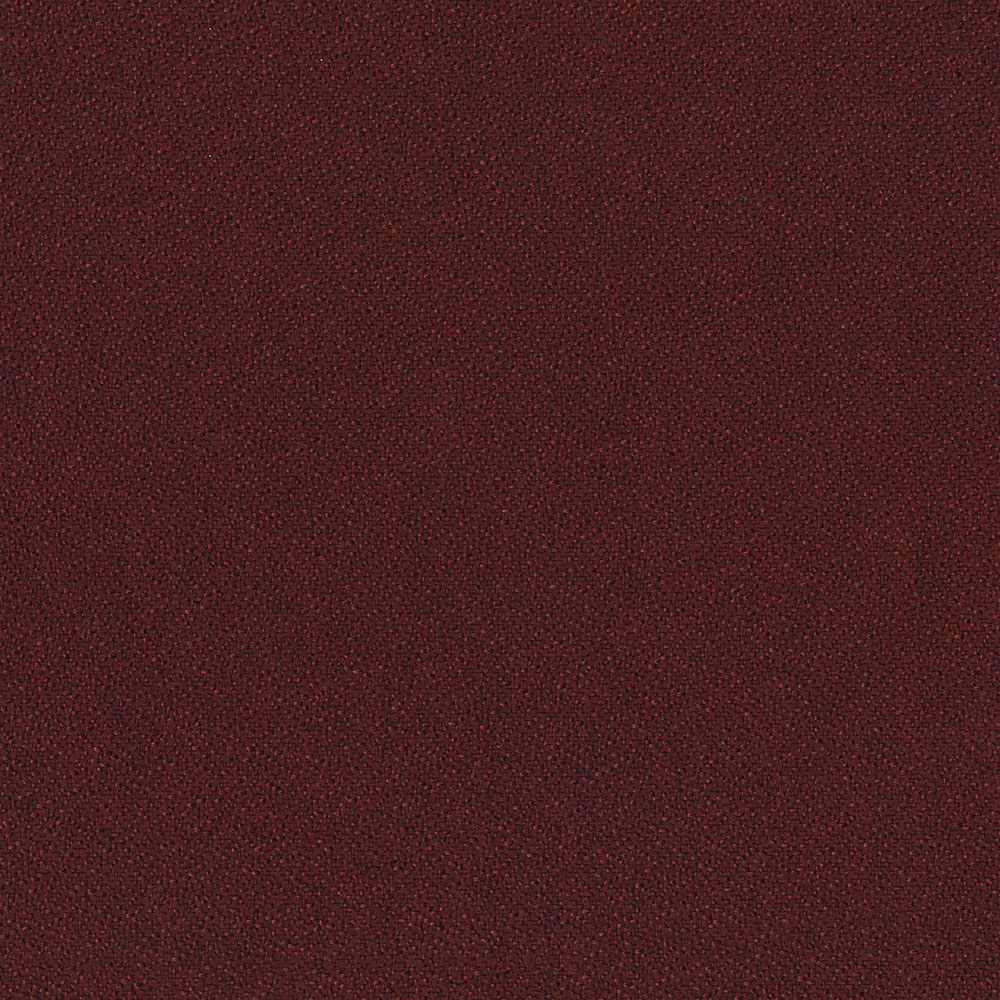 Close-up of dark burgundy leather texture with fine grain, suitable for upholstery or handbags.