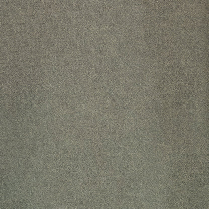 Close-up of flax-colored solid fabric with a subtle texture.