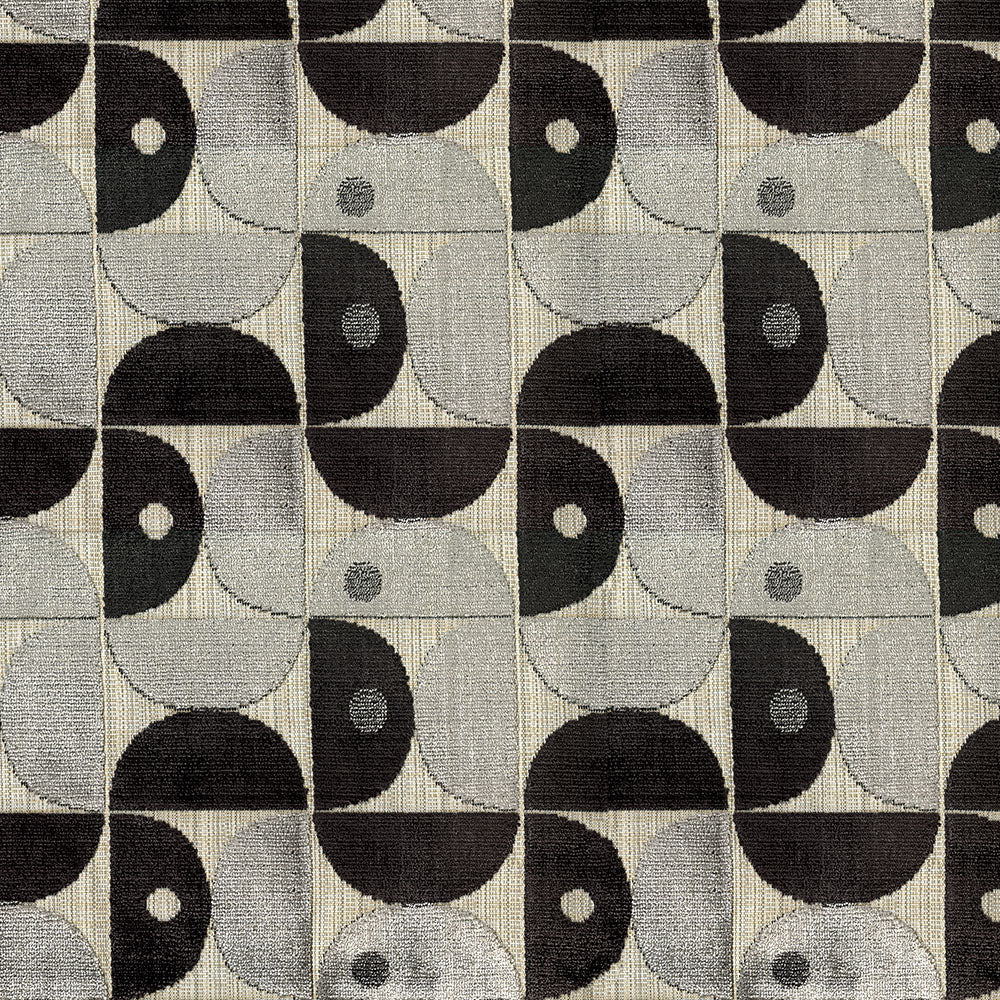 Grayscale woven fabric with repeating geometric pattern of black and gray semicircles forming motifs in a grid