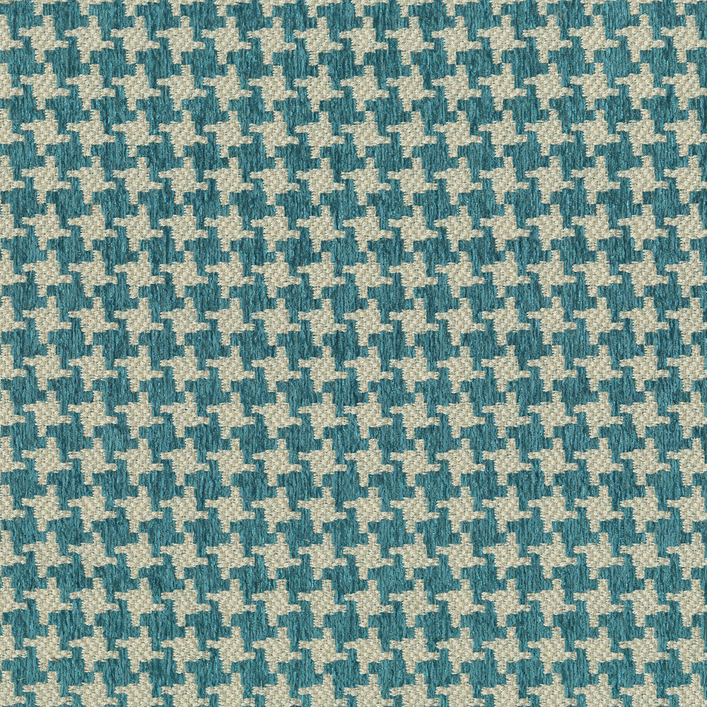 Close-up of teal & cream houndstooth woven fabric, classic geometric pattern for upholstery or apparel.