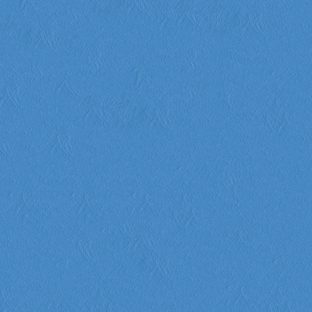 Close-up of bright blue solid fabric with a subtle texture and matte finish.